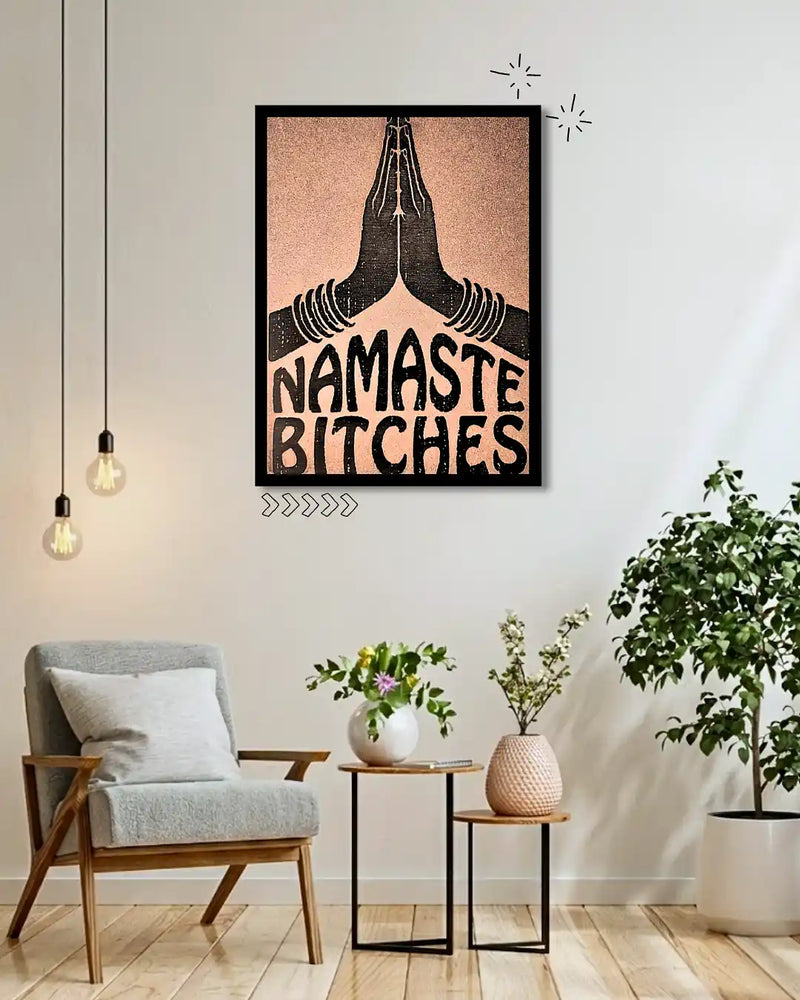Framed artwork with 'Namaste Bitches' text in a modern living room setting.