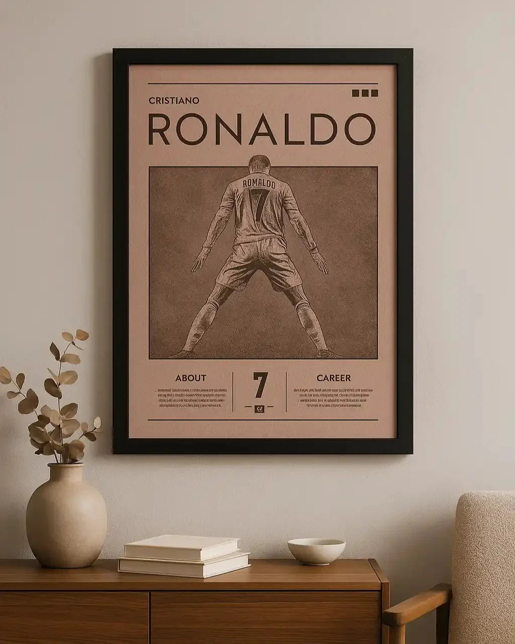 Framed poster of Cristiano Ronaldo on a wall above a wooden cabinet.