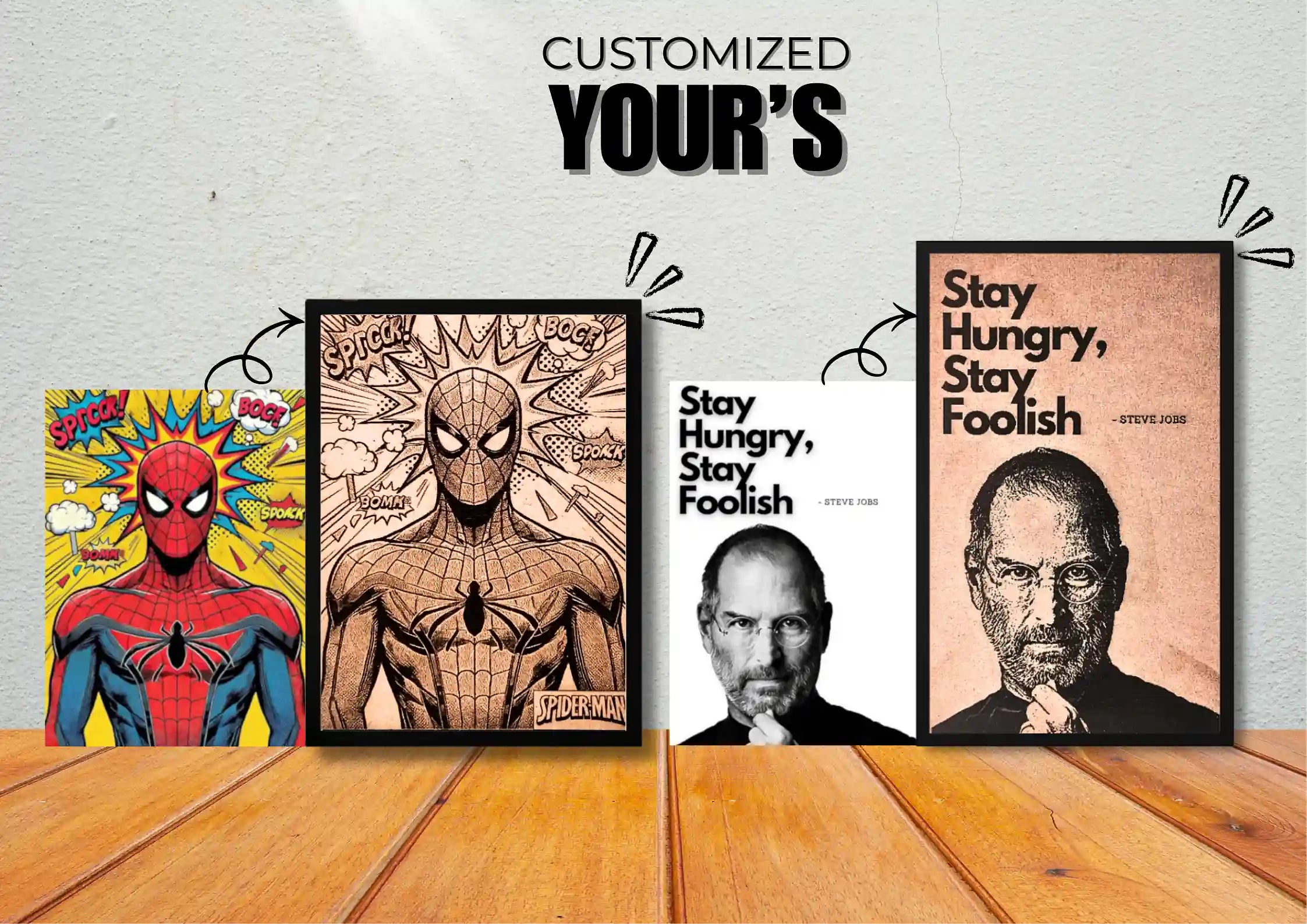 Four framed prints of Spider-Man, a stylized superhero, Steve Jobs, and a quote on a wooden surface with a gray wall background.